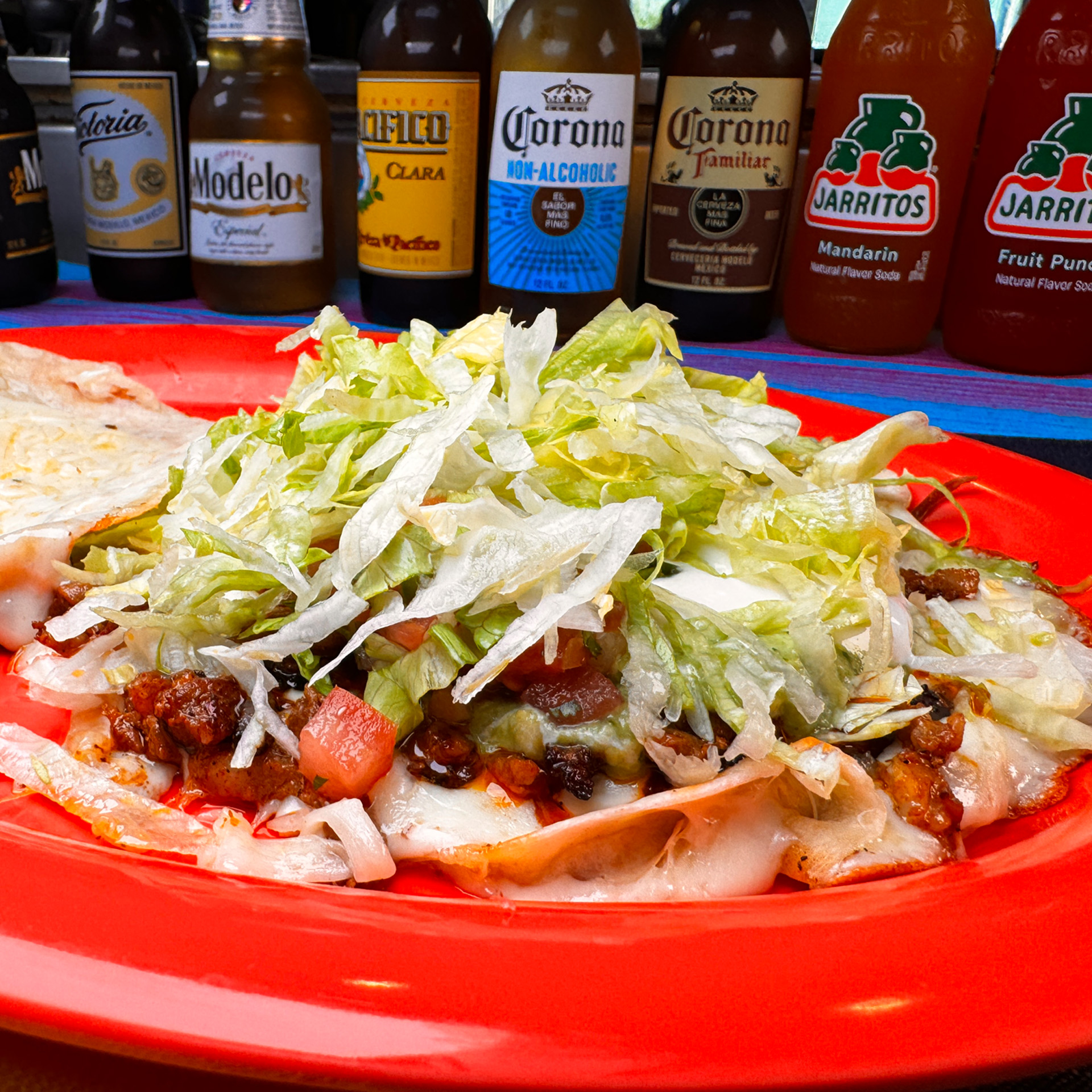 Crispy grilled tortilla filled with melted cheese and savory chorizo.